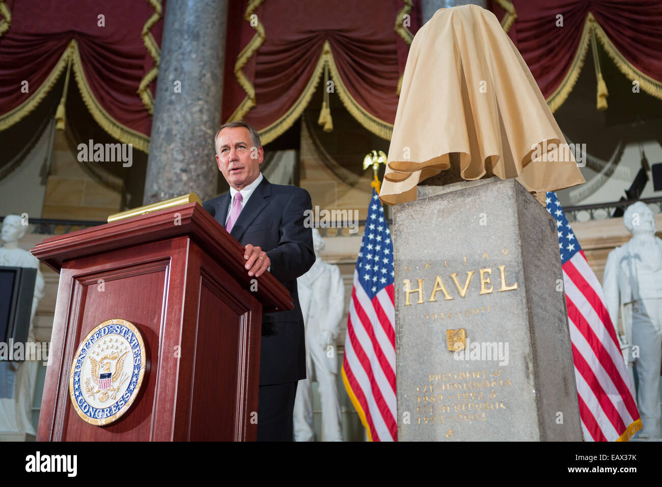 US Speaker of the House John Boehner unveils a bust to honor former Czech President and human rights activist Vaclav Havel during a dedication ceremony in the National Statuary Hall of the U.S. Capitol November 19, 2014 in Washington, DC. Stock Photo