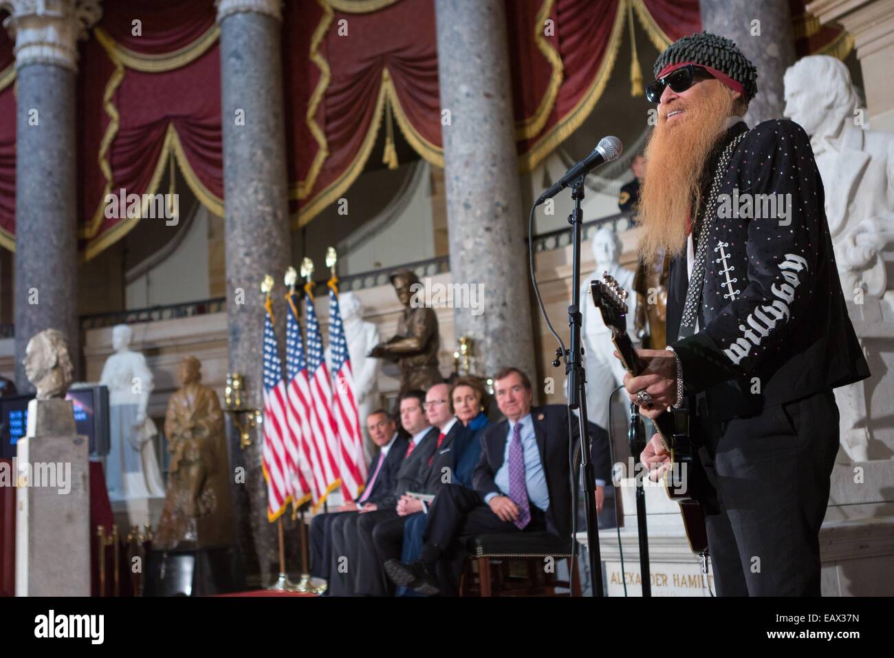 ZZ TOP bandleader and Rock and Roll Hall of Fame member Billy Gibbons performs a musical selection during a bust dedication ceremony to honor former Czech President and human rights activist Vaclav Havel in the National Statuary Hall of the U.S. Capitol November 19, 2014 in Washington, DC. Stock Photo