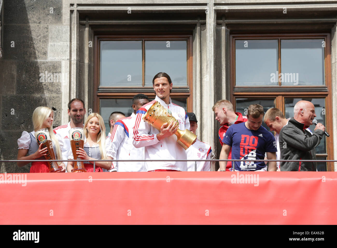Bayern Muenchen presenting the trophy to the fans at Marienplatz after winning the DFB Cup Final match.  Featuring: Daniel Van Buyten Where: Munich, Germany When: 18 May 2014 Stock Photo