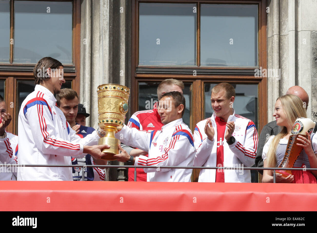 Bayern Muenchen presenting the trophy to the fans at Marienplatz after winning the DFB Cup Final match.  Featuring: Daniel Van Buyten,Rafimha Where: Munich, Germany When: 18 May 2014 Stock Photo