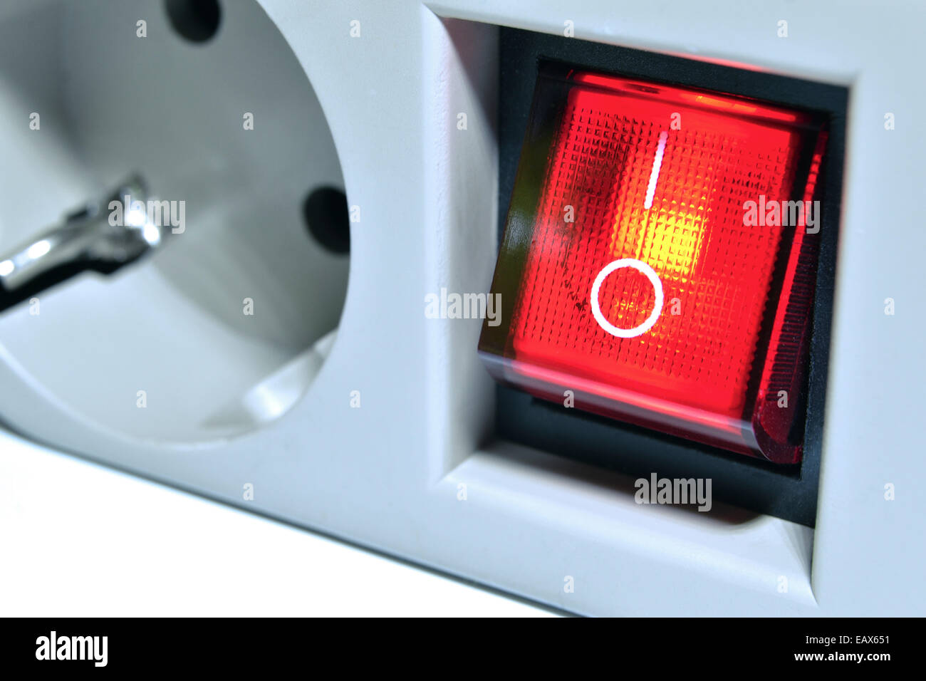 closeup of electrical line with power switch button with focus on