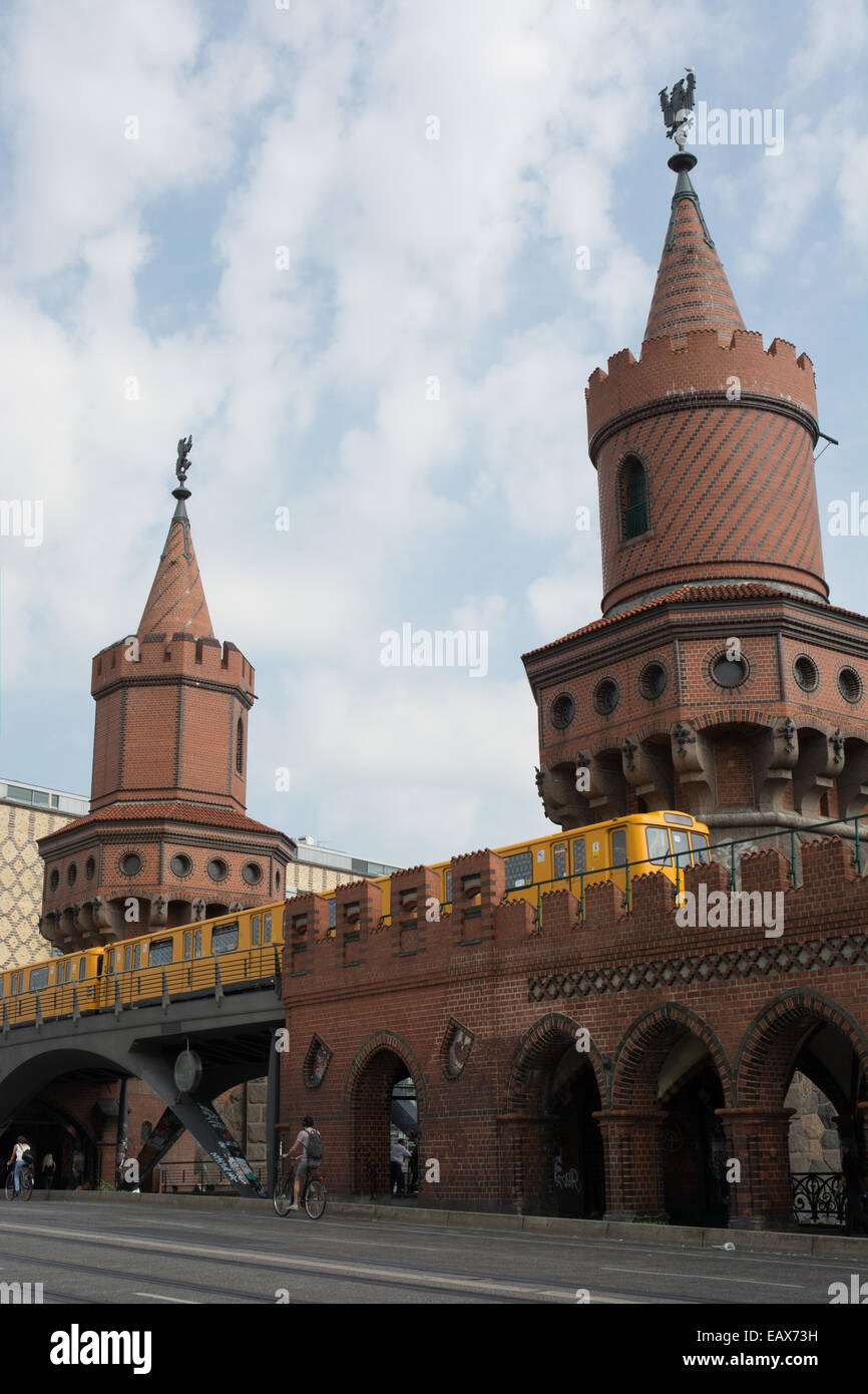 A U-Bahn train on route U1 passes the ornate towers on the Oberbaumbrücke to the east of Berlin Stock Photo
