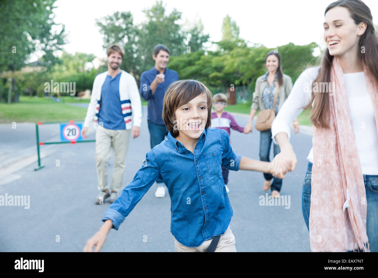 Family walking together outdoors Stock Photo