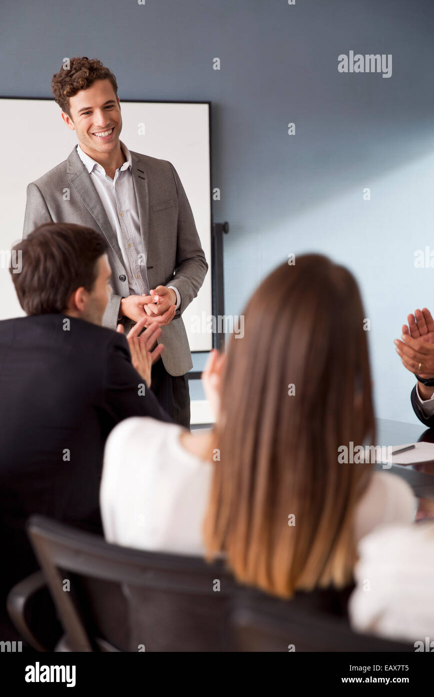 Businessman facilitating group discussion at business meeting Stock Photo