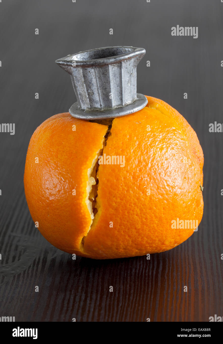 Orange with Vintage Fruit Juice Extractor Stock Photo
