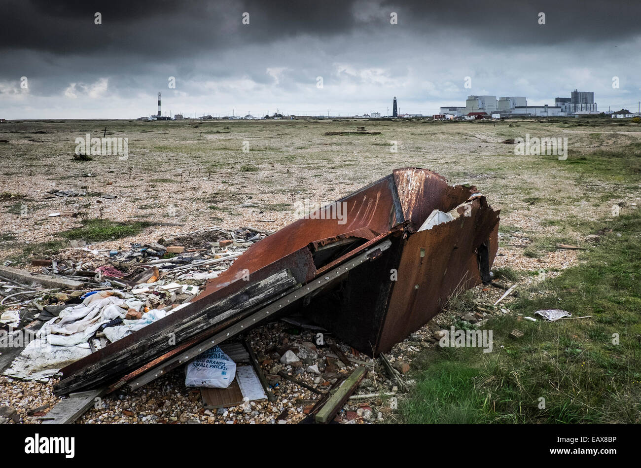 Various items of rubbish left on the foreland at Dungeness in Kent.  A site of special scientific significance. Stock Photo