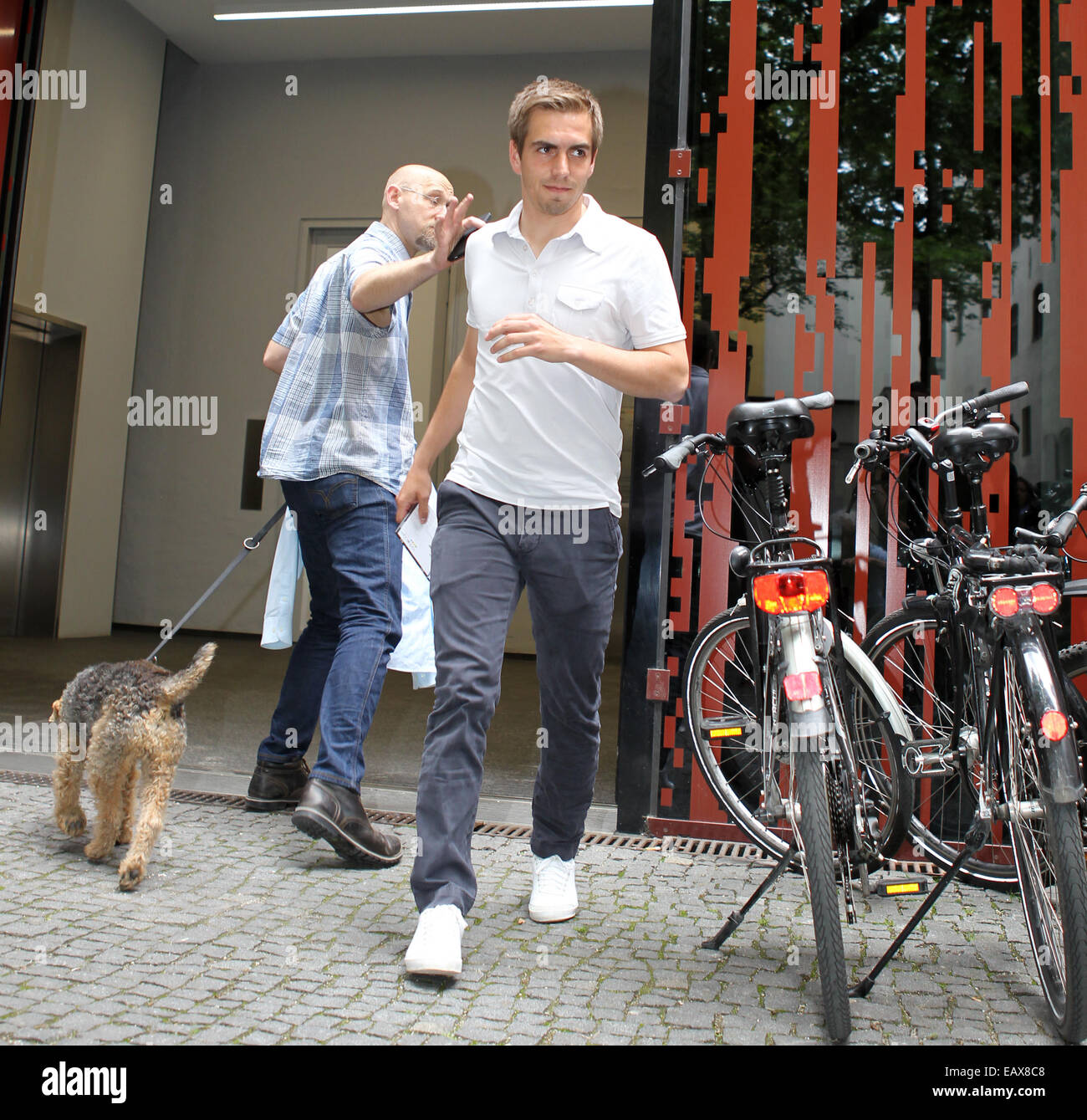 Bayern München player Philipp Lahm leaving Dr. Hans-Wilhelm Müller-Wohlfahrt's medical practice.  Featuring: Philipp Lahm Where: München, Germany When: 19 May 2014 Stock Photo