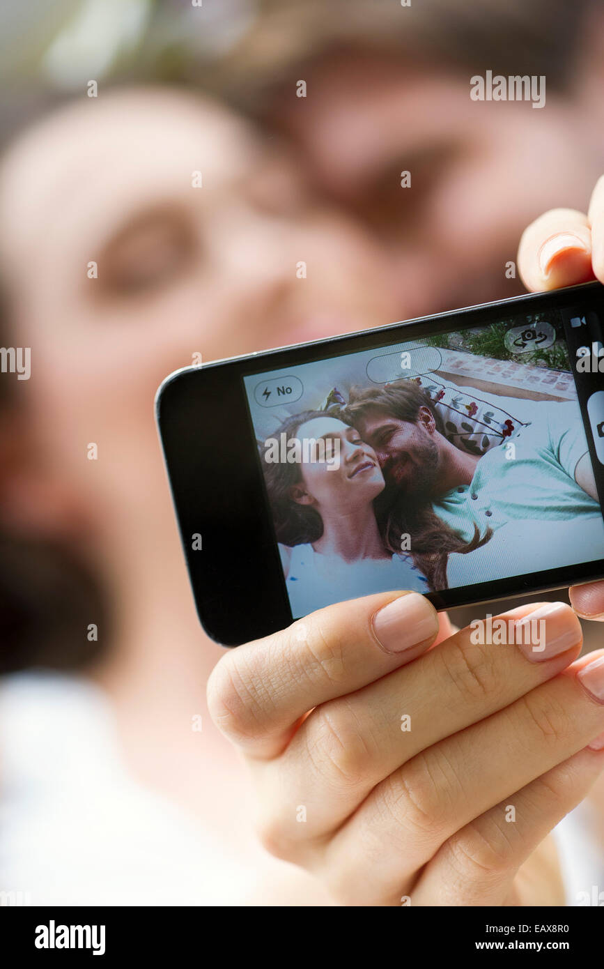 Young couple taking selfie with smartphone Stock Photo