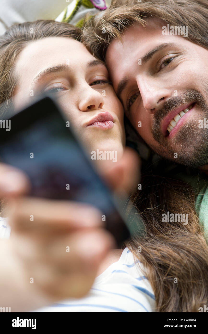 Young couple taking selfie with smartphone Stock Photo