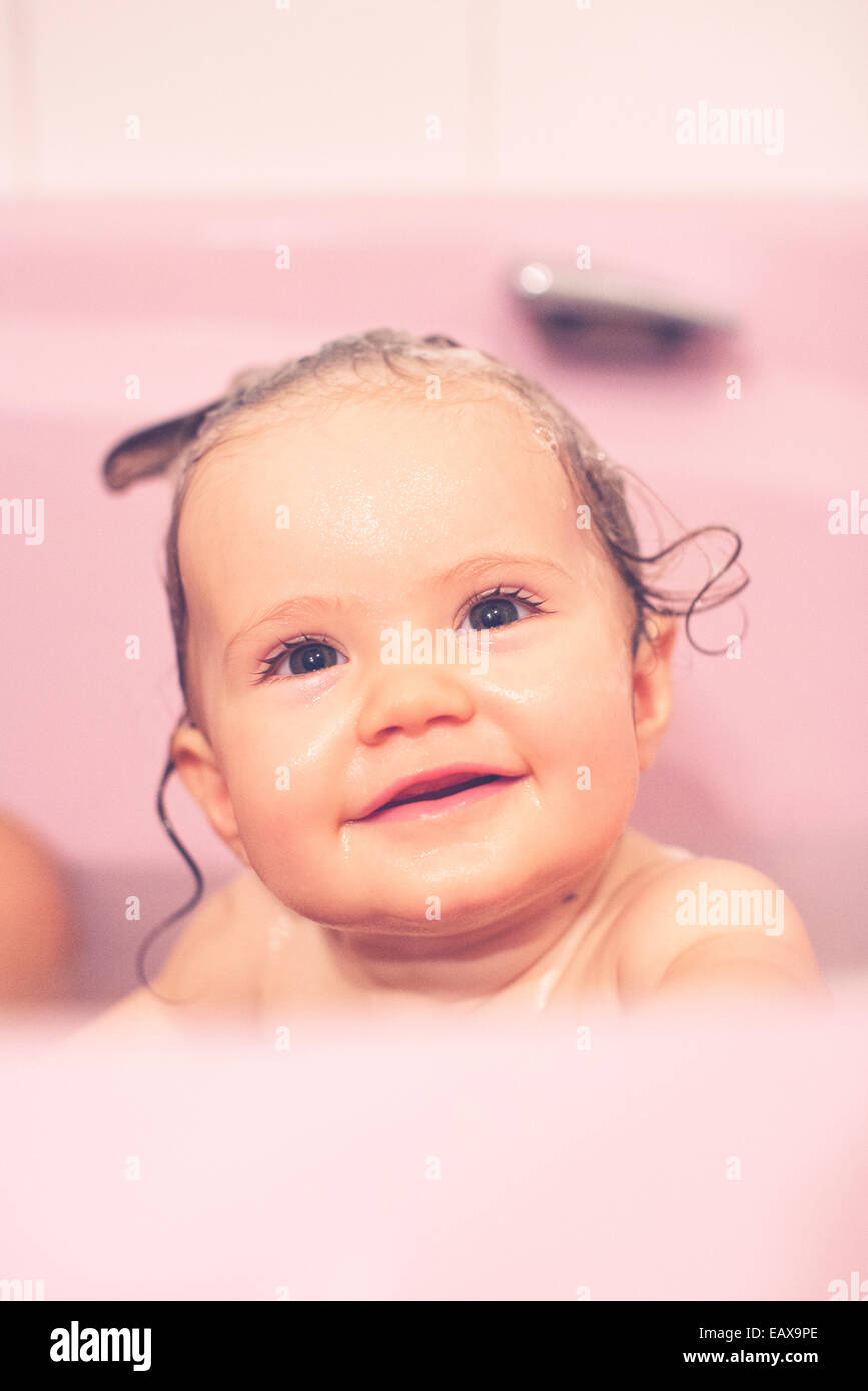 Baby girl taking bath hires stock photography and images Alamy
