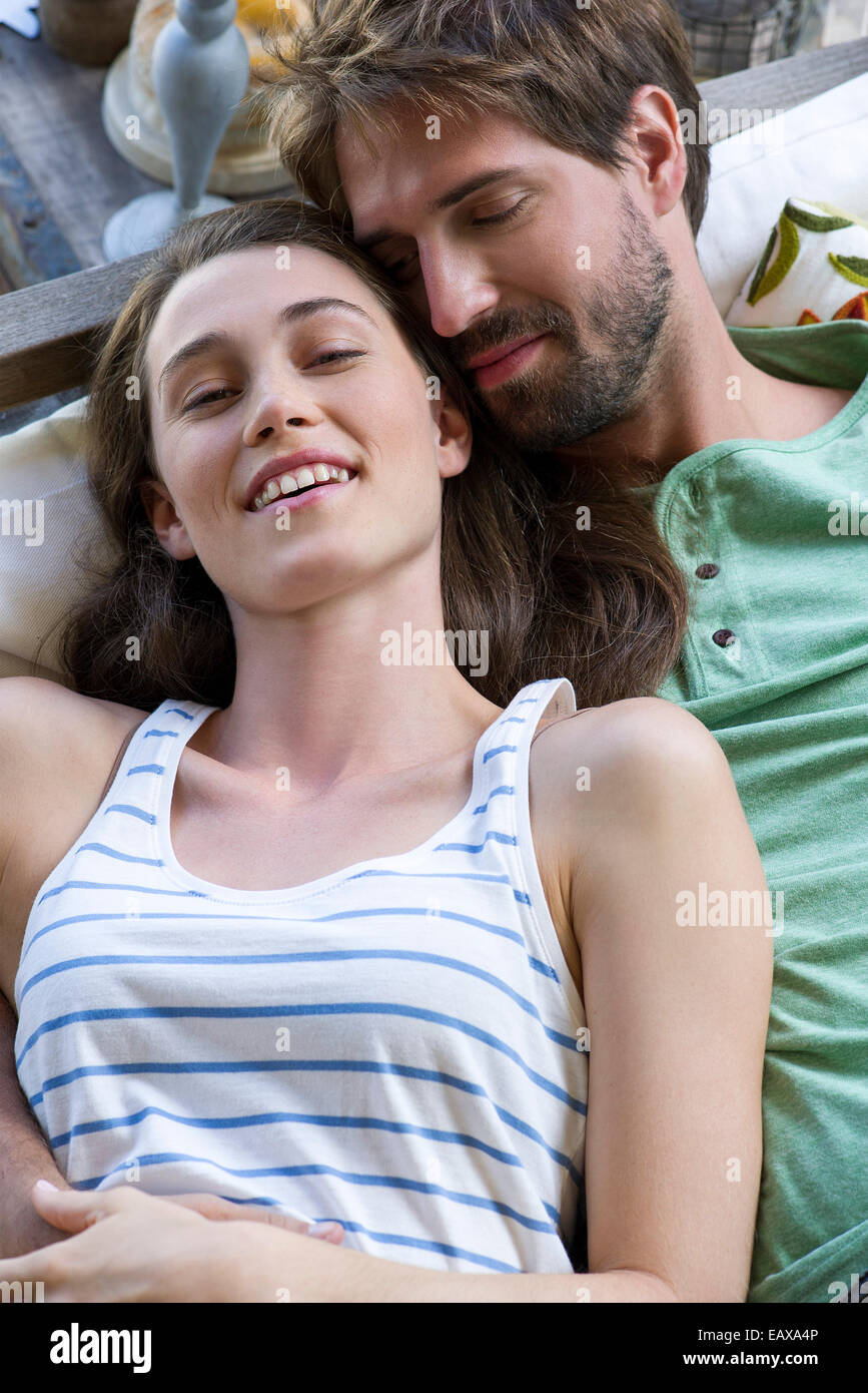 Young couple reclining together Stock Photo Alamy