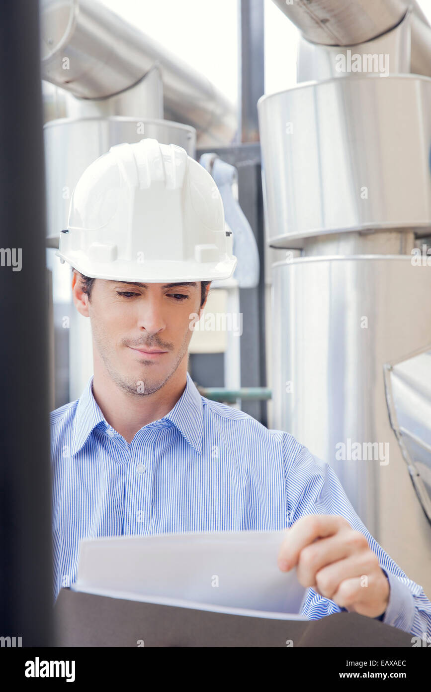Engineer working in industrial plant Stock Photo Alamy