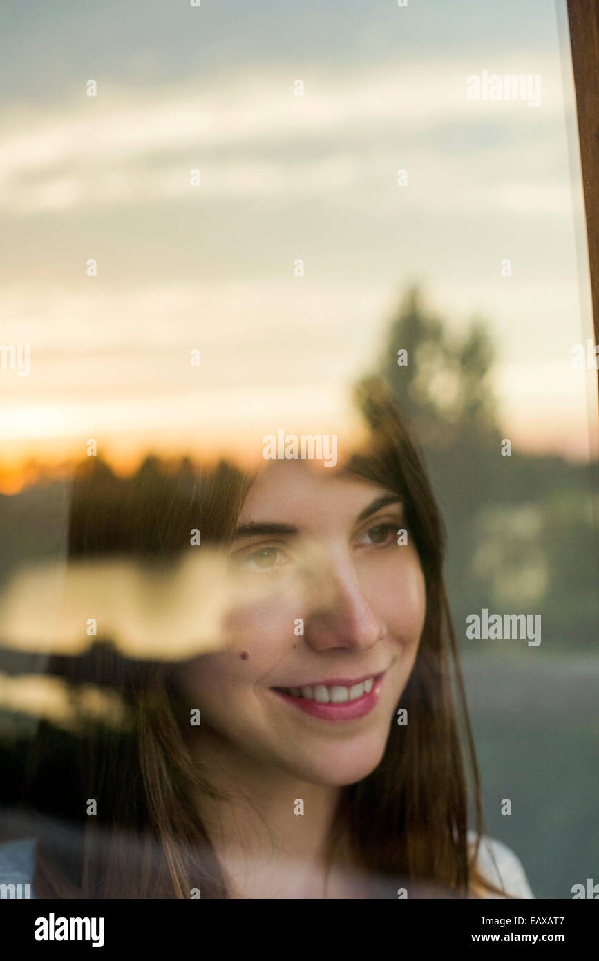 Woman contemplating private future while watching sunrise Stock Photo