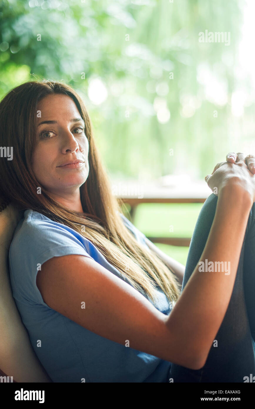 Woman getting away from it all Stock Photo