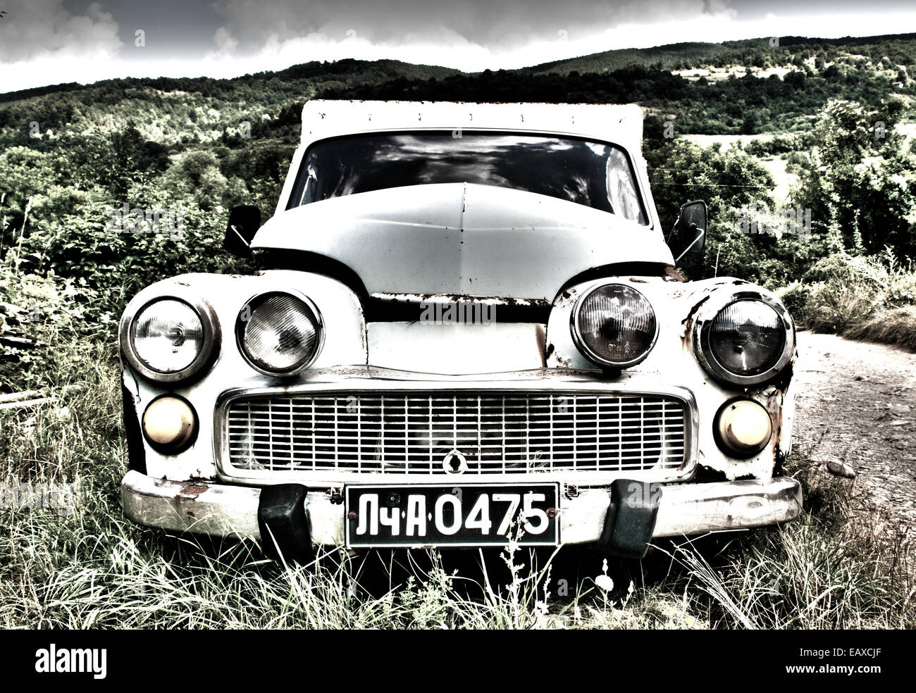 A high dynamic range image of a very old car. Stock Photo