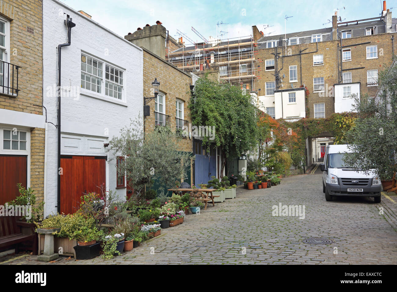 A typical Mews street in London's affluent Bayswater district. Houses were formerly stables and now sell for over £2 million Stock Photo