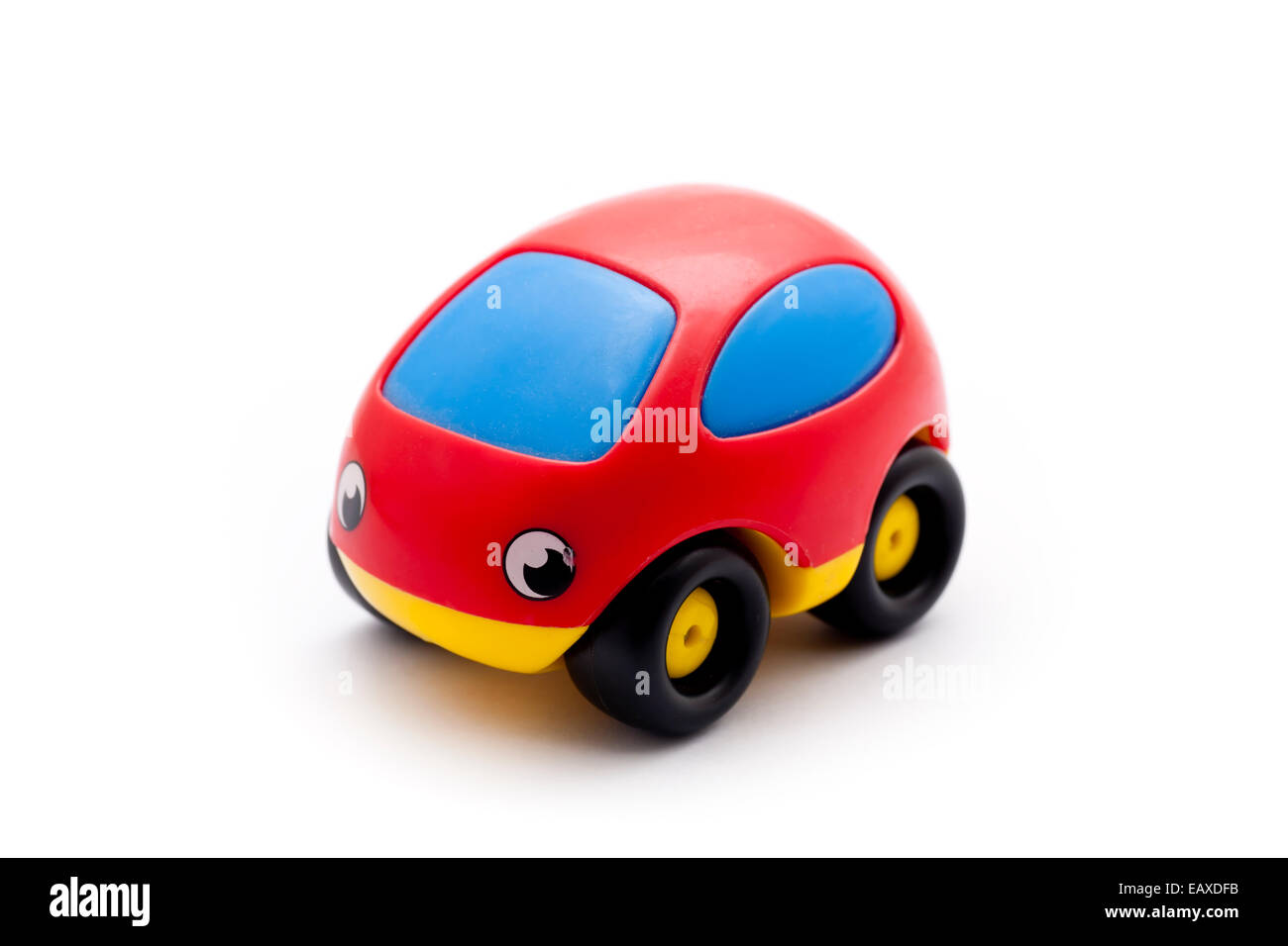 Red toy car isolated on white background. Stock Photo