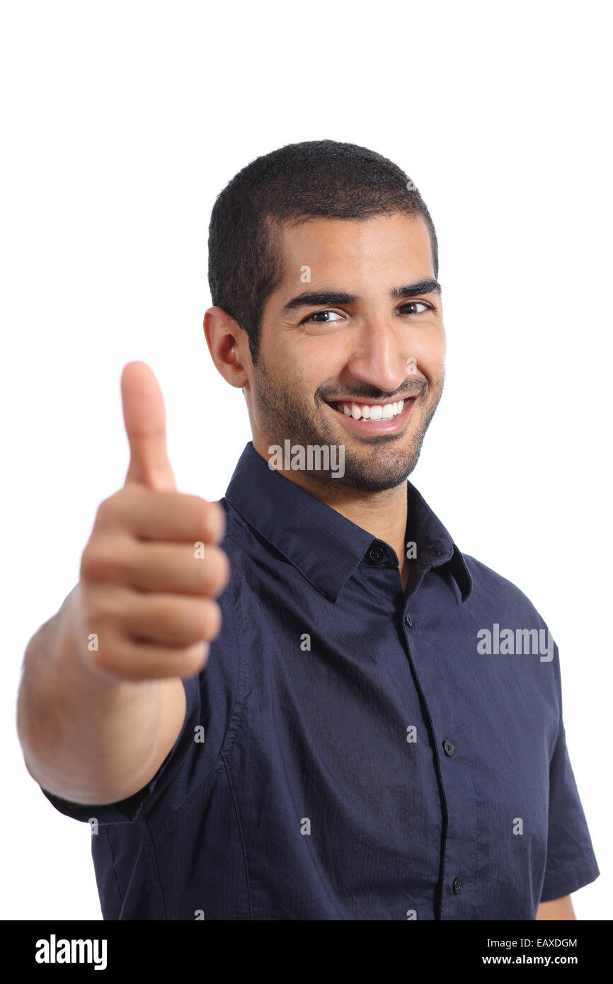 Positive arab man gesturing thumbs up isolated on a white background Stock Photo