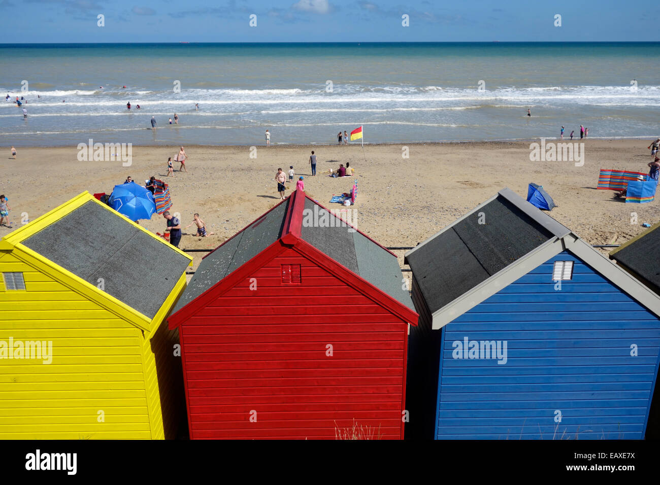 Row of colourful beach huts at the beach at Mundesley, Norfolk Stock Photo