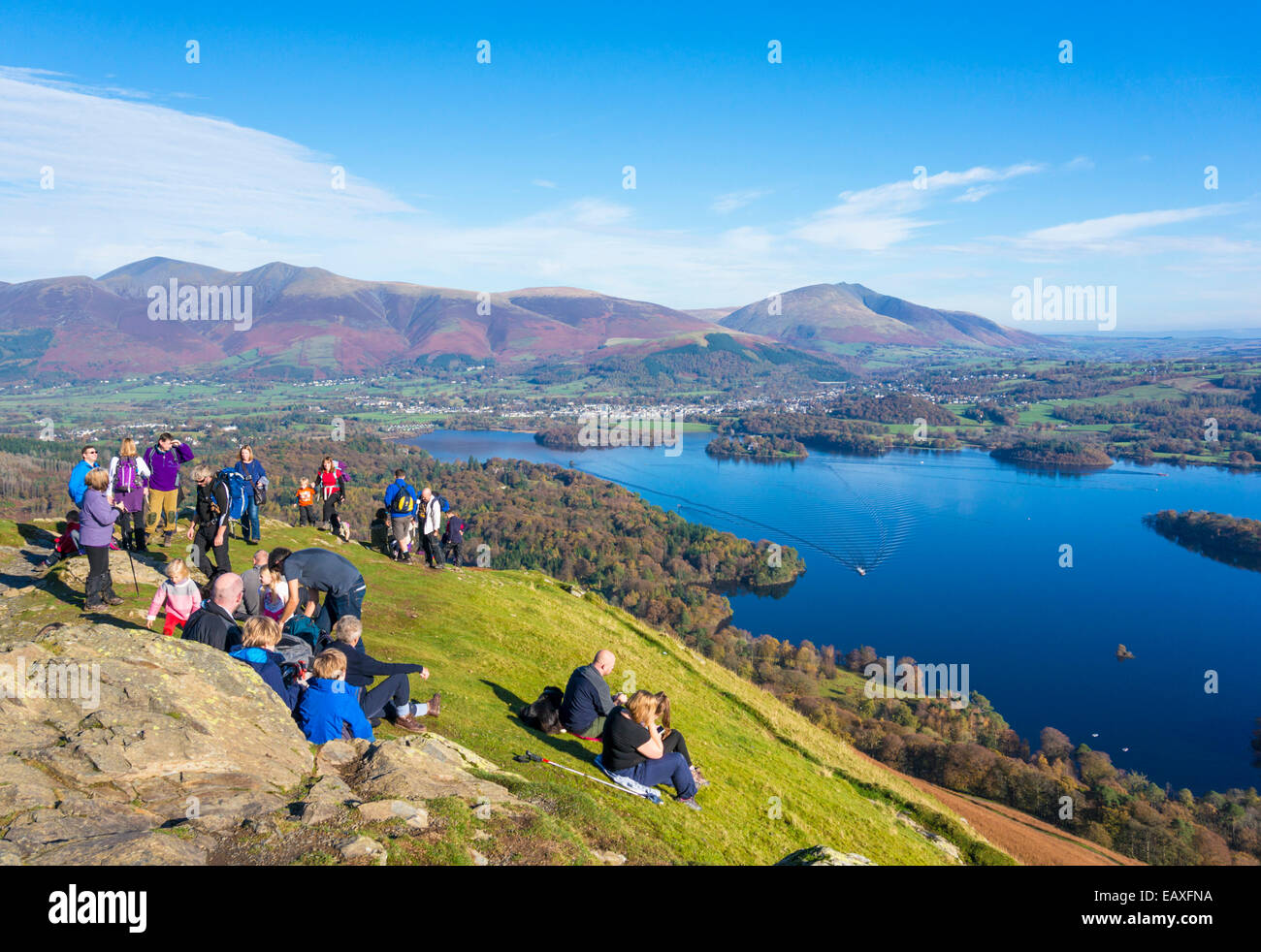 Hikers resting on Catbells above Derwent Water English Lake District Cumbria England UK GB EU Europe Stock Photo