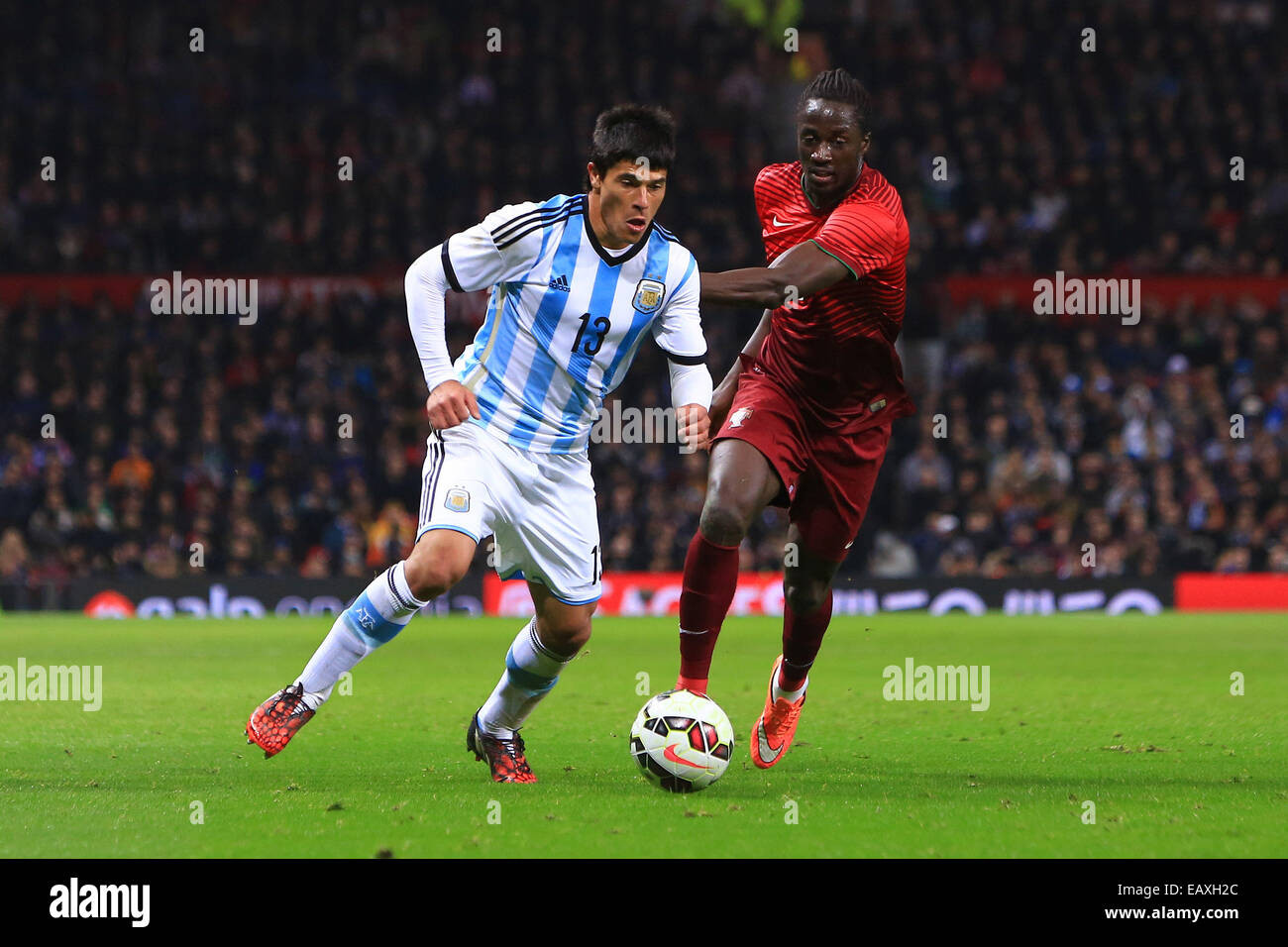 Manchester, UK. 18th Nov, 2014. Facundo Roncaglia of Argentina and Eder of Portugal - Argentina vs. Portugal - International Friendly - Old Trafford - Manchester - 18/11/2014 Pic Philip Oldham/Sportimage © csm/Alamy Live News Stock Photo