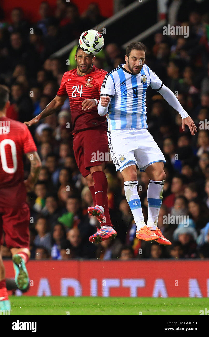 Manchester, UK. 18th Nov, 2014. Adrien Silva of Portugal and Gonzalo Higuain of Argentina - Argentina vs. Portugal - International Friendly - Old Trafford - Manchester - 18/11/2014 Pic Philip Oldham/Sportimage © csm/Alamy Live News Stock Photo