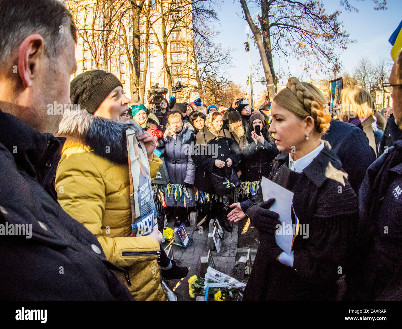Kiev, Ukraine. 21st Nov, 2014. Yulia Tymoshenko speaks with relatives of the heroes of the Heavenly Hundreds -- Ukrainians celebrated the anniversary of Euromaidan, which was a wave of demonstrations and civil unrest in Ukraine, which began on 21 November 2013 with public protests in Independence Square in Kiev, demanding closer European integration. Credit:  Igor Golovnov/Alamy Live News Stock Photo