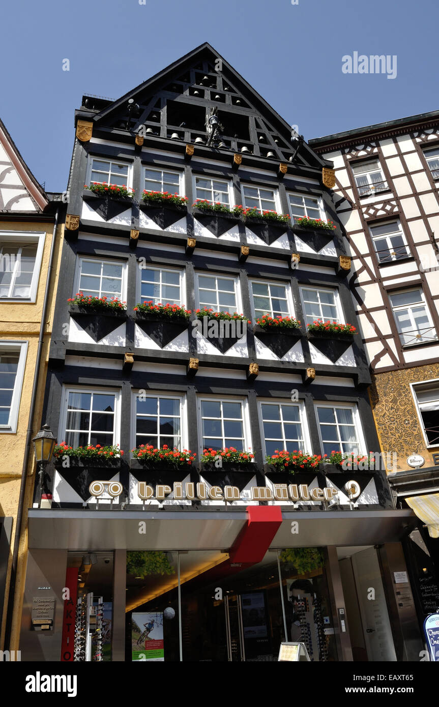 A half timbered building in the Marketplace, Cochem, Germany. The bells play a tune at certain times of the day. Stock Photo