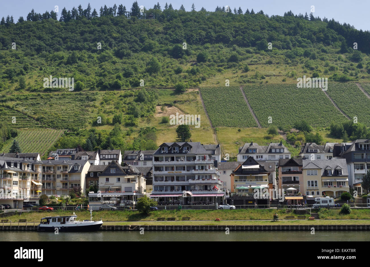 Hotels and guesthouses line the banks of the Moselle in the Cond district of Cochem, Germany. Stock Photo
