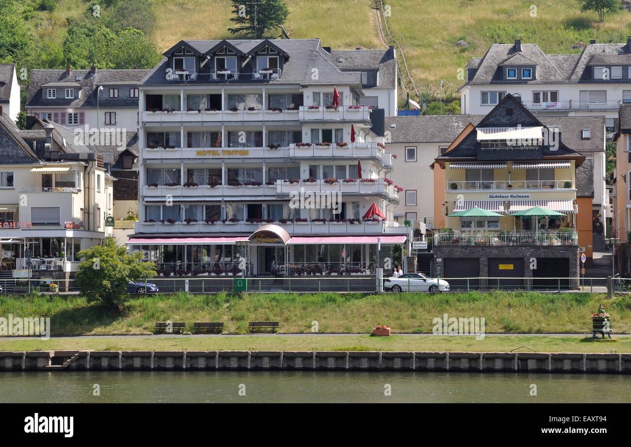 Hotel Triton and Gastehaus Hallmann in the Cond district of Cochem, Germany, on the bank of the Moselle River. Stock Photo