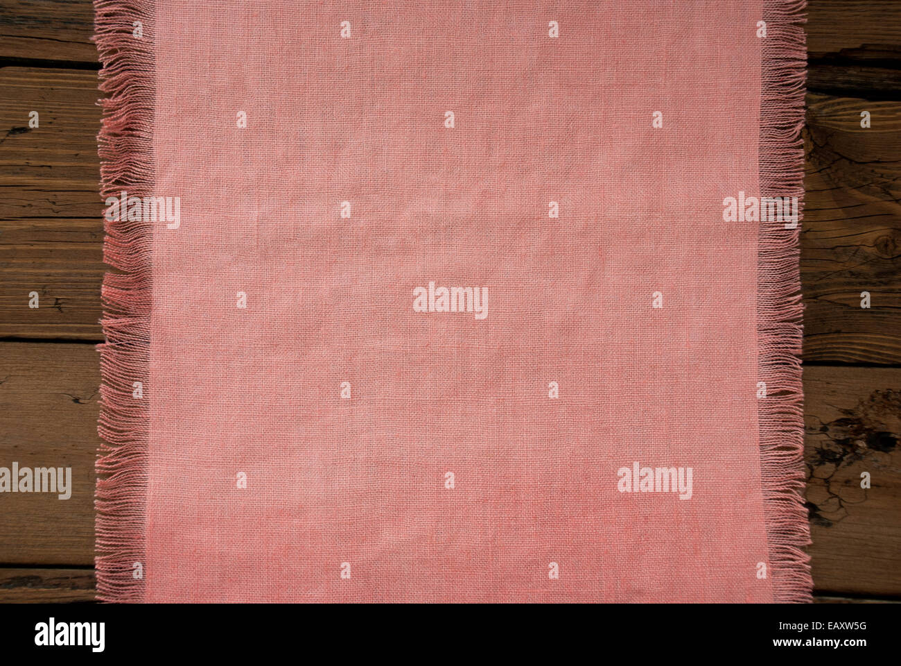 Pink Natural Fabric Place Mat As Texture With Copy Space On Wooden Background With Country Style Stock Photo