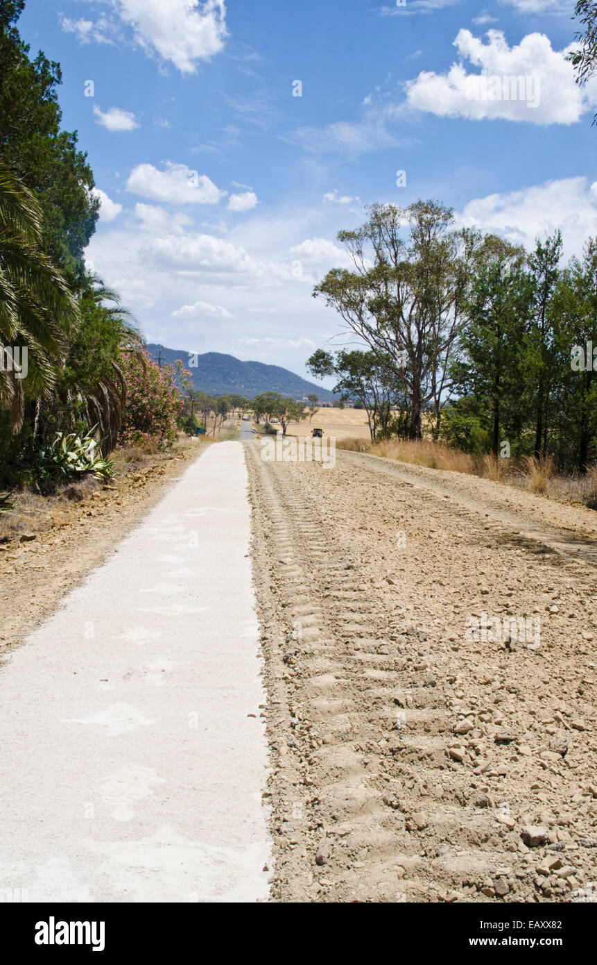 Roadlime Roadbuilding. Lime and aggregate partially mixed by stabilizer Stock ...