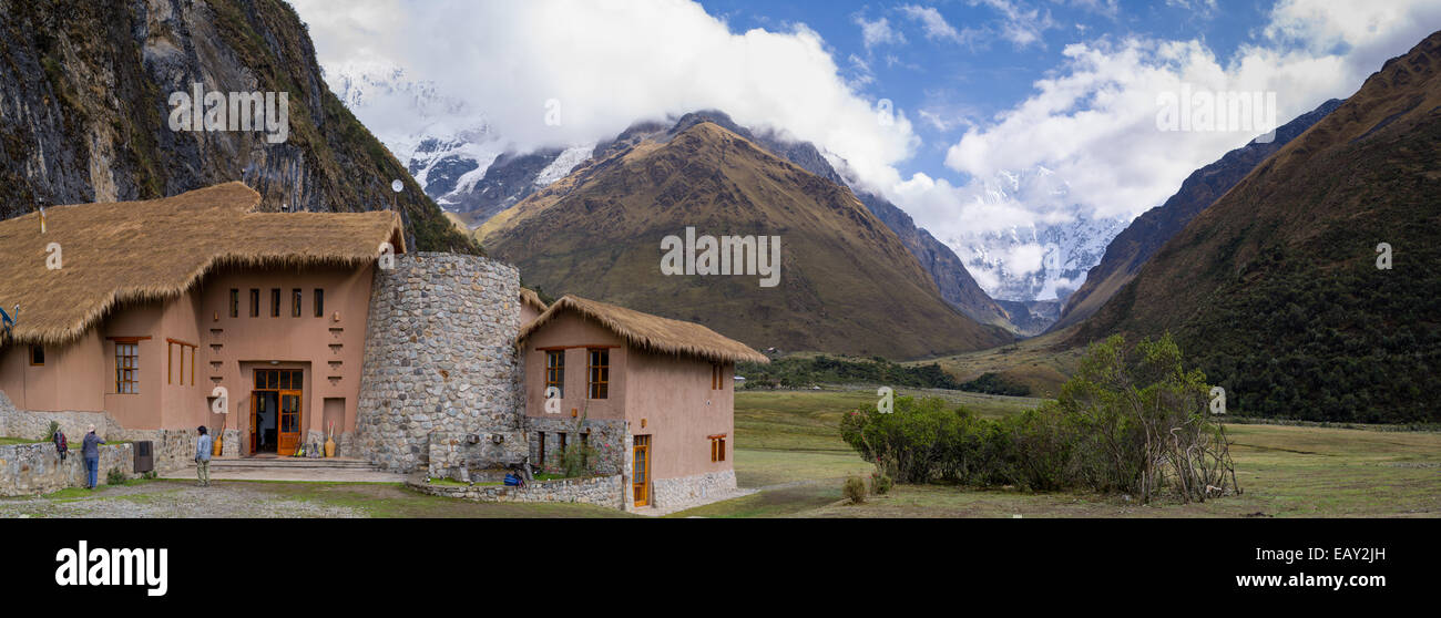 Panoramic view of Salkantay Lodge, with Nevado Humantay and Salkantay mountain (right)  in the distance; Soraypampa, Peru. Stock Photo