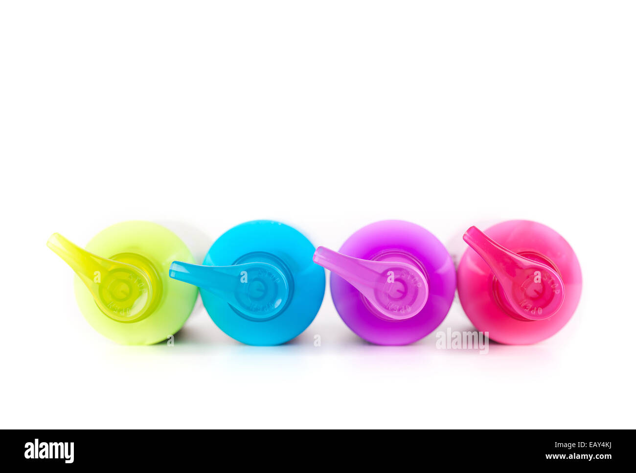 Multicoloured neon lotion bottles with dispenser pump Stock Photo