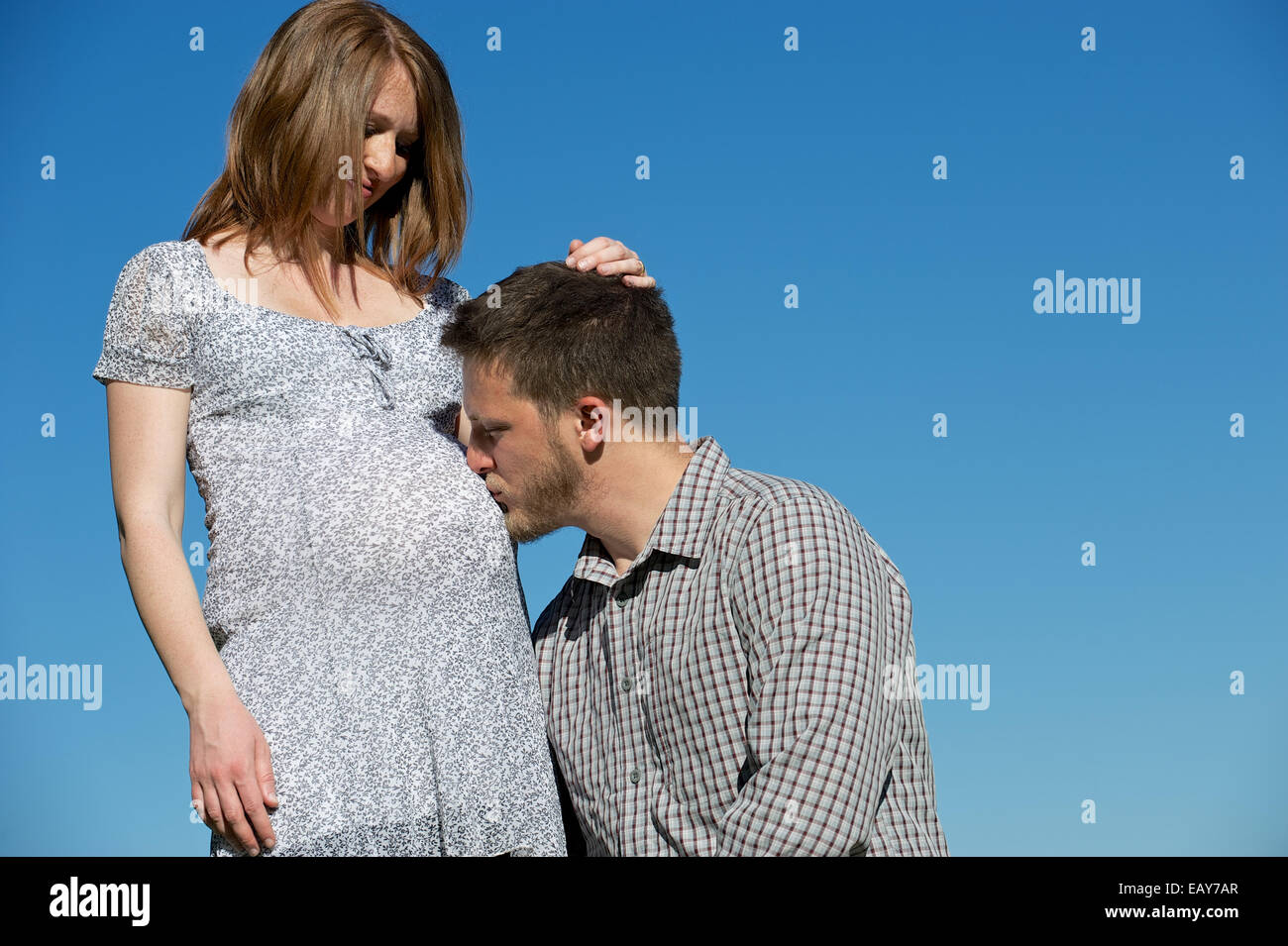 kissing pregnancy Stock Photo