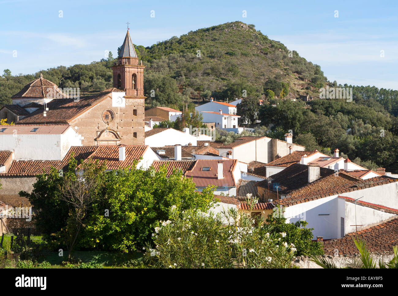 Church and village houses of Santa Ana de Real, Sierra de Aracena, Huelva province, Spain Stock Photo