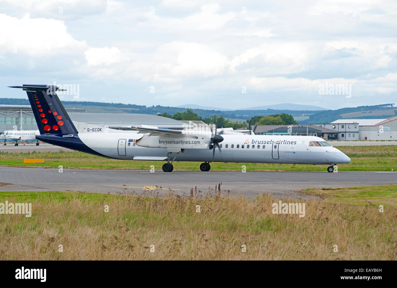 Bombardier DHC-8-402 Q400 of Brussels Airlines departing Inverness Dalcross, airport. Scotland. SCO 9184. Stock Photo