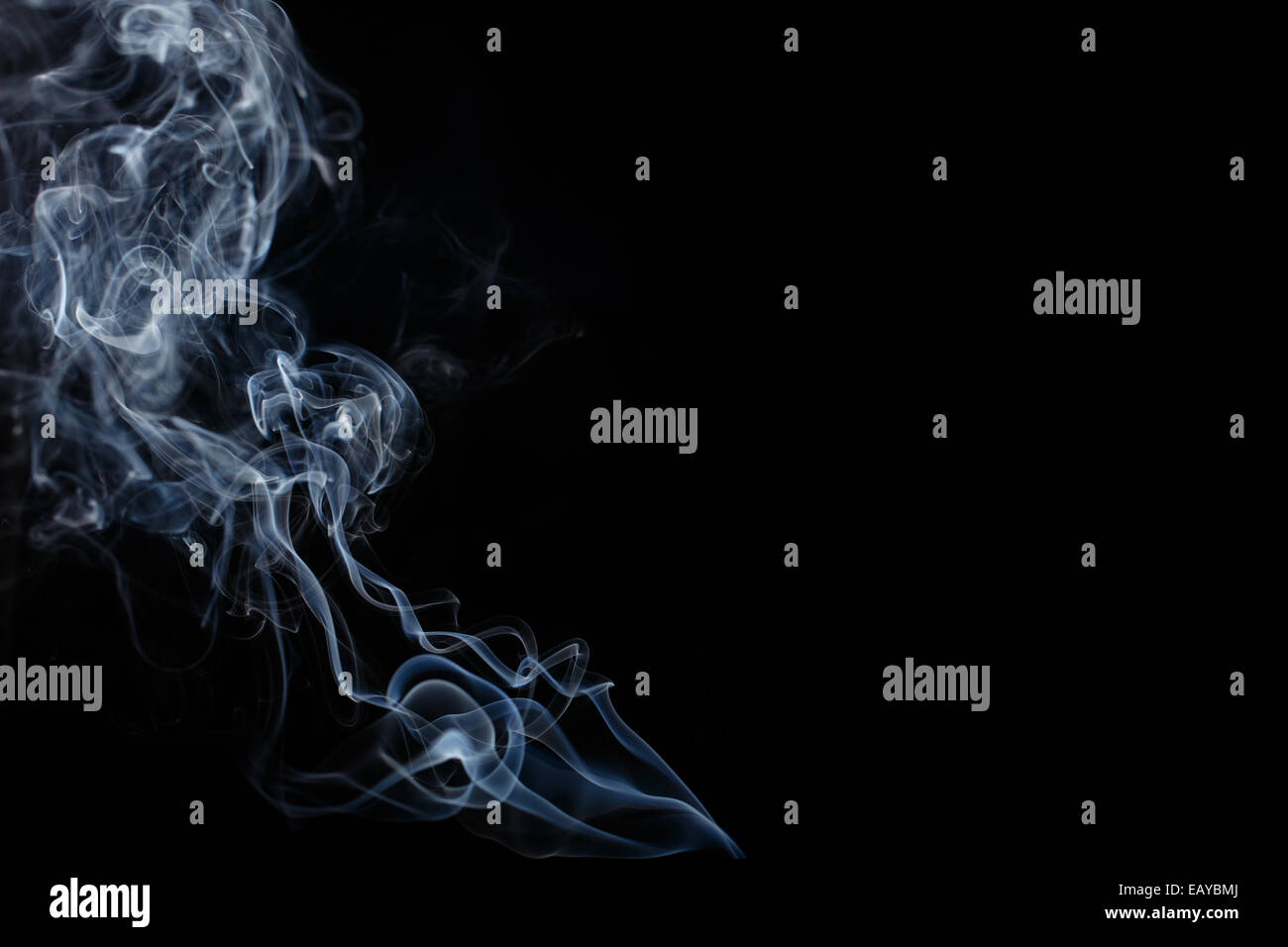 Abstract smoke moves on a black background Stock Photo - Alamy