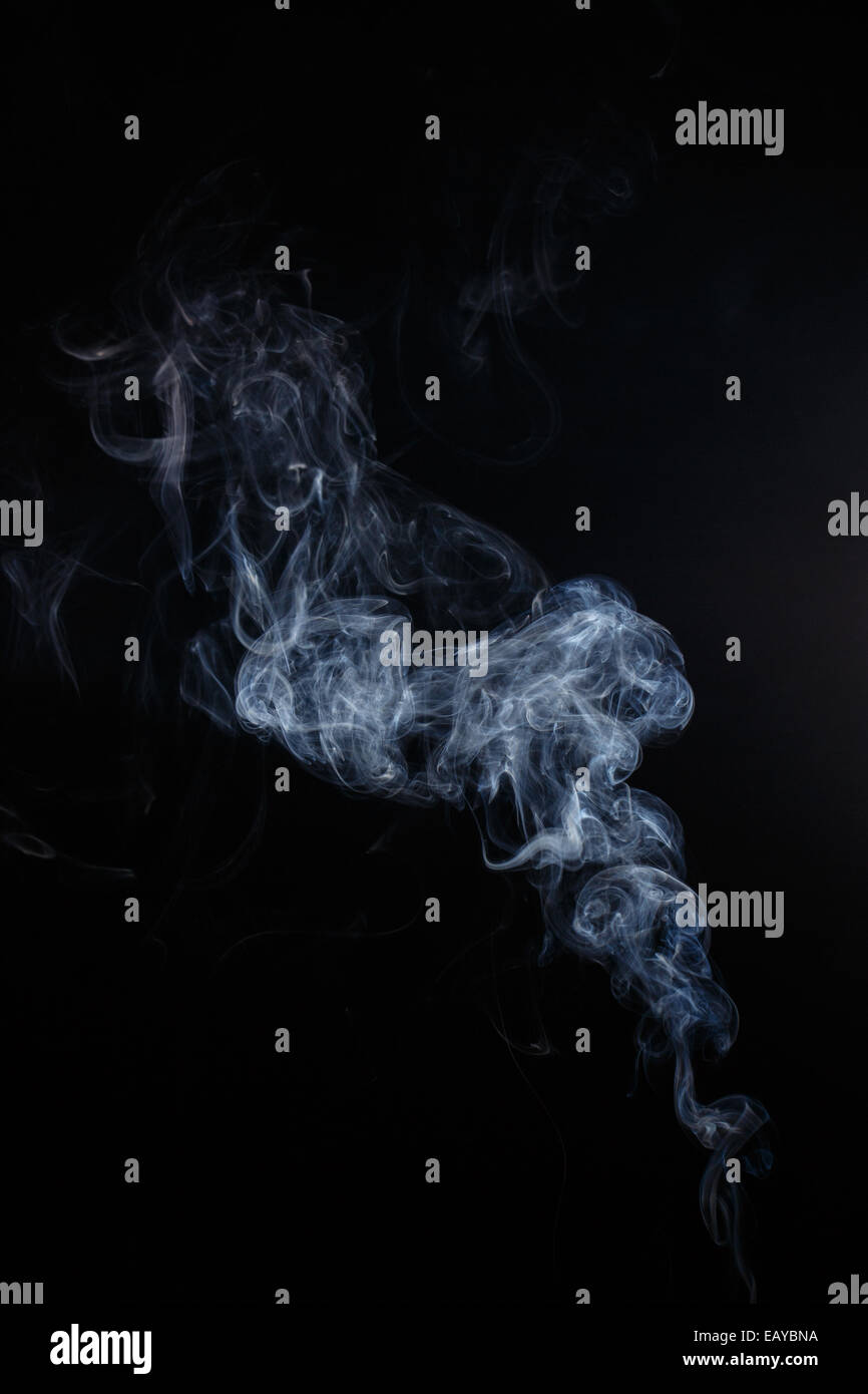Abstract smoke moves on a black background Stock Photo - Alamy