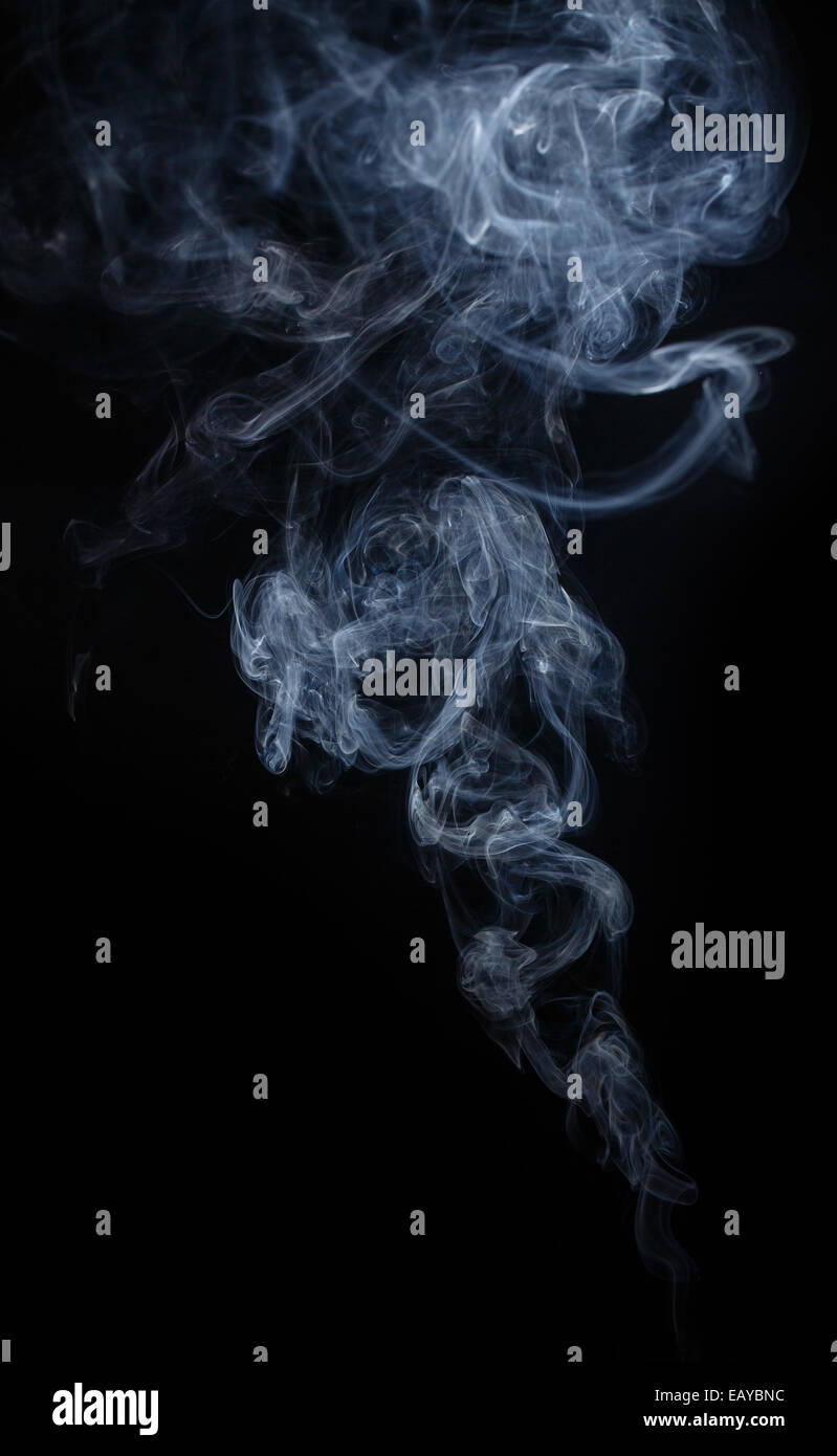 Abstract smoke moves on a black background Stock Photo - Alamy