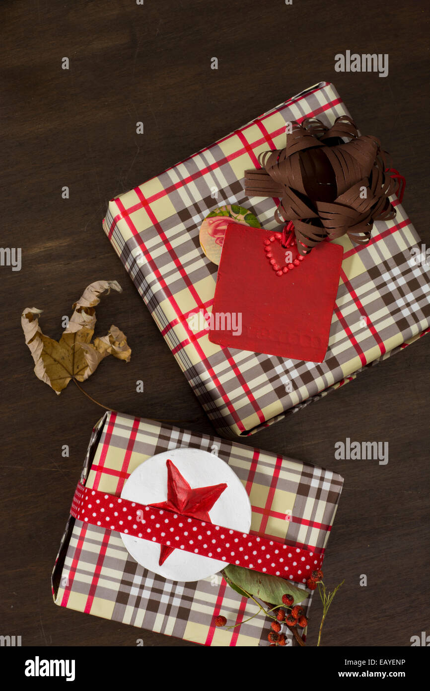 presents wrapped in checkered paper and dotted ribbon with red star