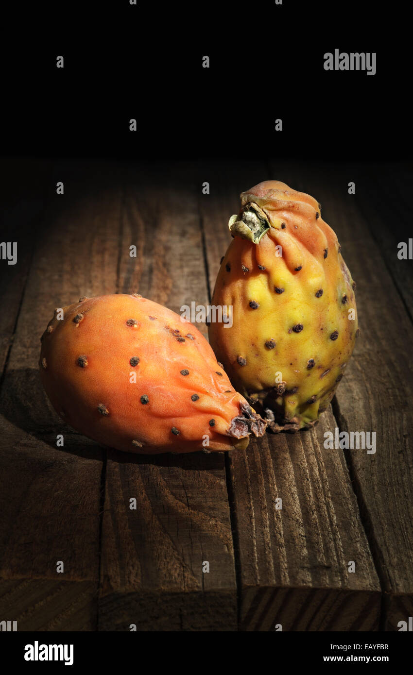Prickly Pears on wooden background Stock Photo
