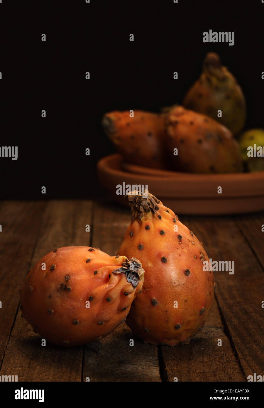 Prickly Pears on wooden Table Stock Photo