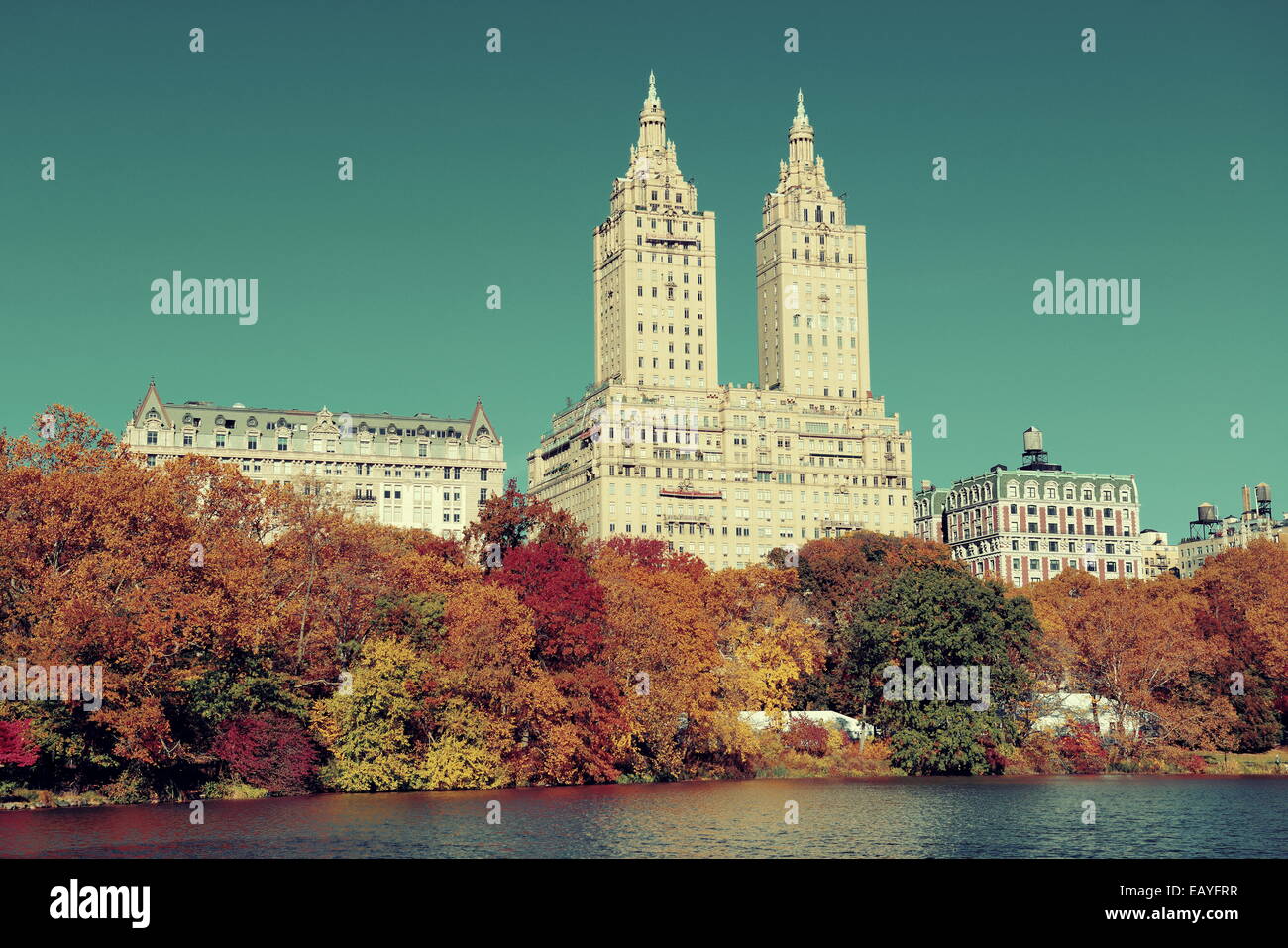 Central Park Autumn and buildings in midtown Manhattan New York City ...