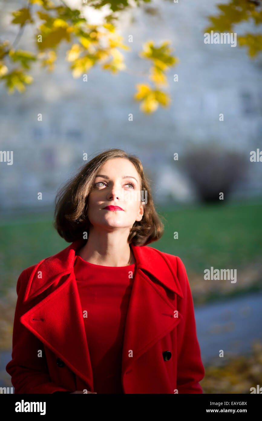Young woman walking at autumn park at day Stock Photo - Alamy