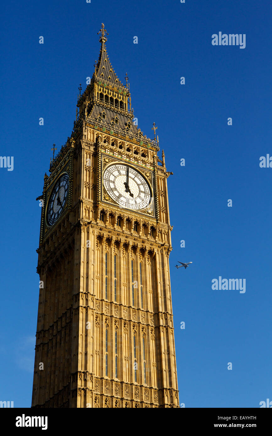 Elizabeth Tower. The famous tower located at the houses of parliament in London. The tower houses the bell Big Ben. Clear blue sky background. Stock Photo