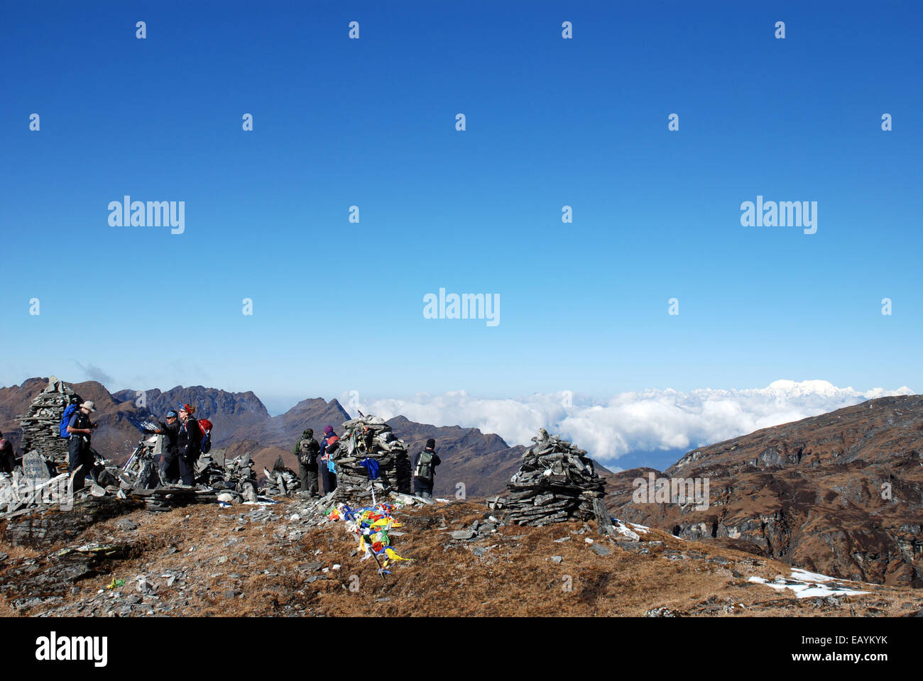 A group of trekkers at a high point on the Singalila ridge in the Indian Himalayas close to the mountain of Kanchenjunga Stock Photo