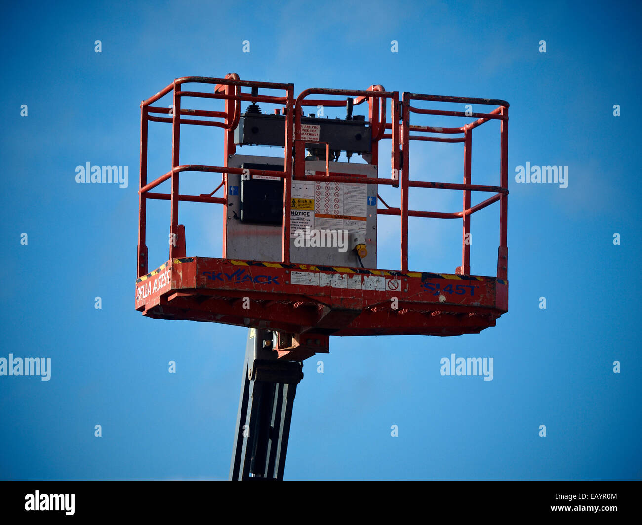 Cherry picker basket isolated against blue sky Stock Photo Alamy
