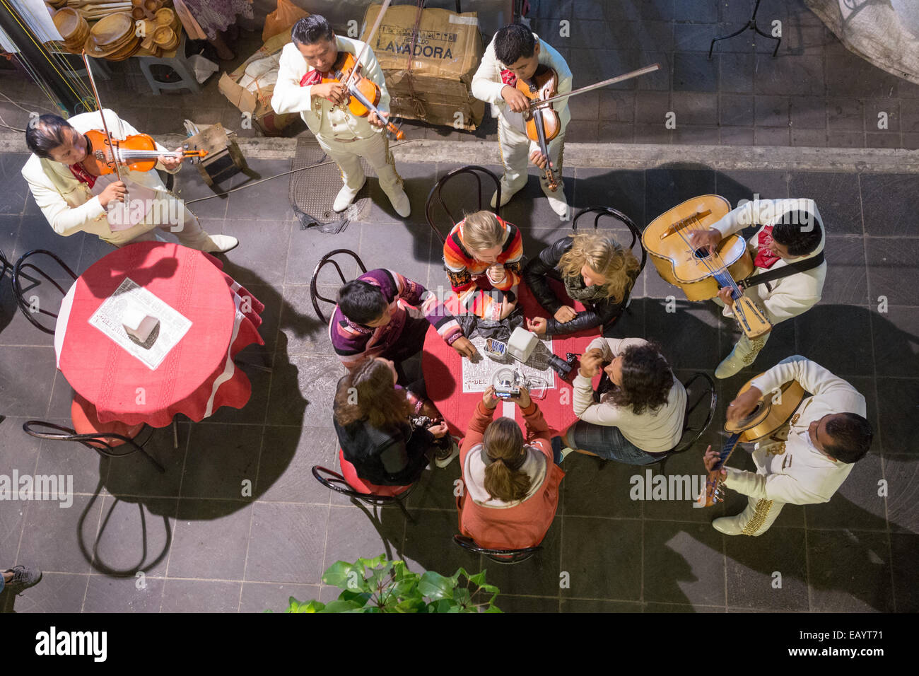 A mariachi band plays for tourists in the Zocalo or town square in Oaxaca, Mexico. Stock Photo