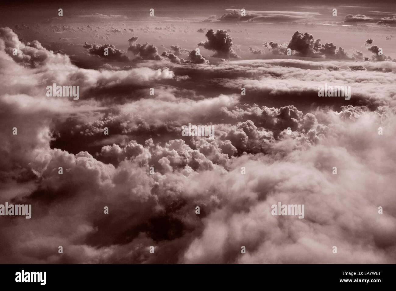 High altitude clouds, cumulus clouds, in Sepia toned, dramatic photograph. Stock Photo